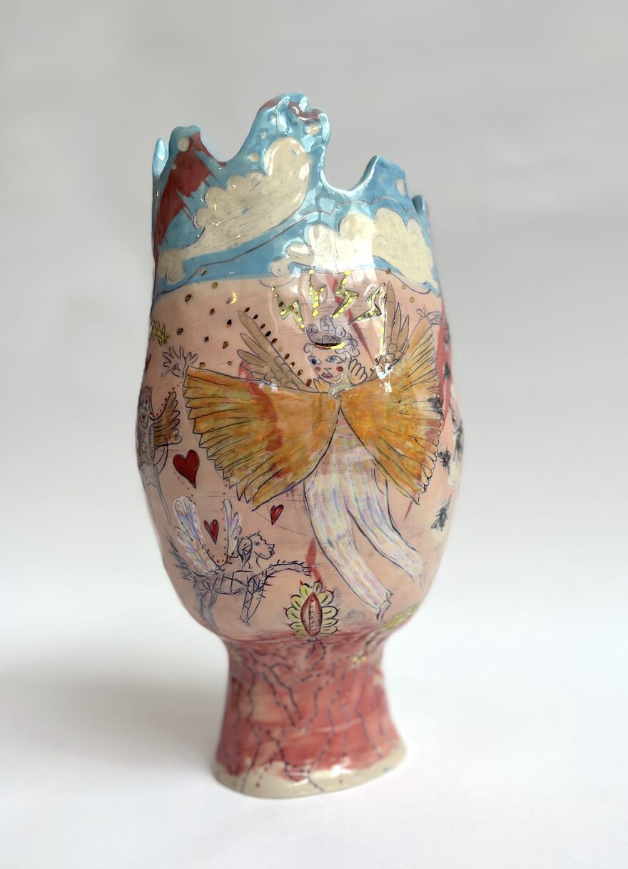 Ceramic vessel decorated with a figure with wings