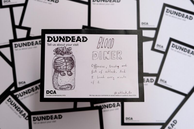 Dundead comment card for Blood Diner with drawing of a brain in a jar and text: Offensive, trashy and full of schlock. And I loved every minute of it.