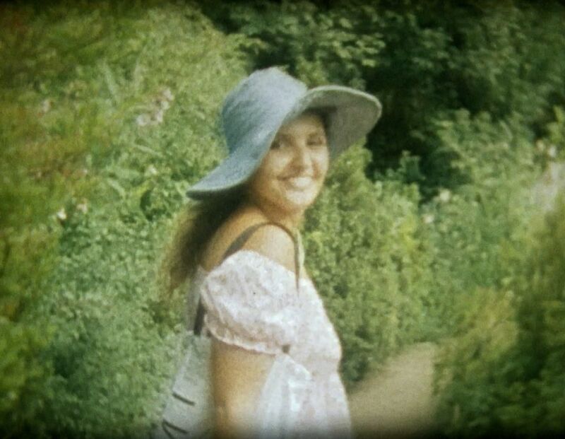 A woman in a broad brimmed hat