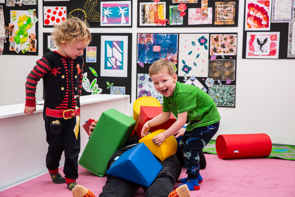 Children playing with soft shapes