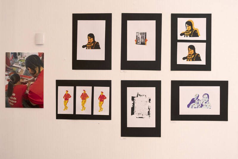 Display of prints on the wall of Gallery 1 for Spring Holiday Pop-up 