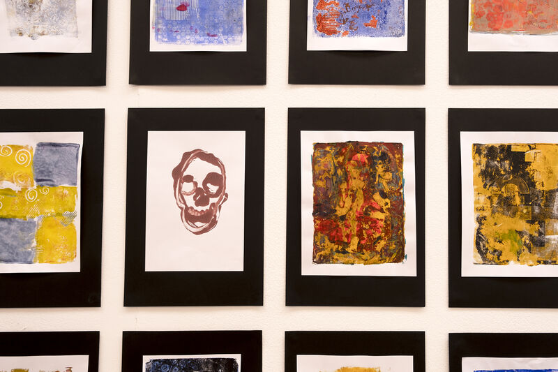 Abstract prints on the wall of Gallery 1 for Spring Holiday Pop-up