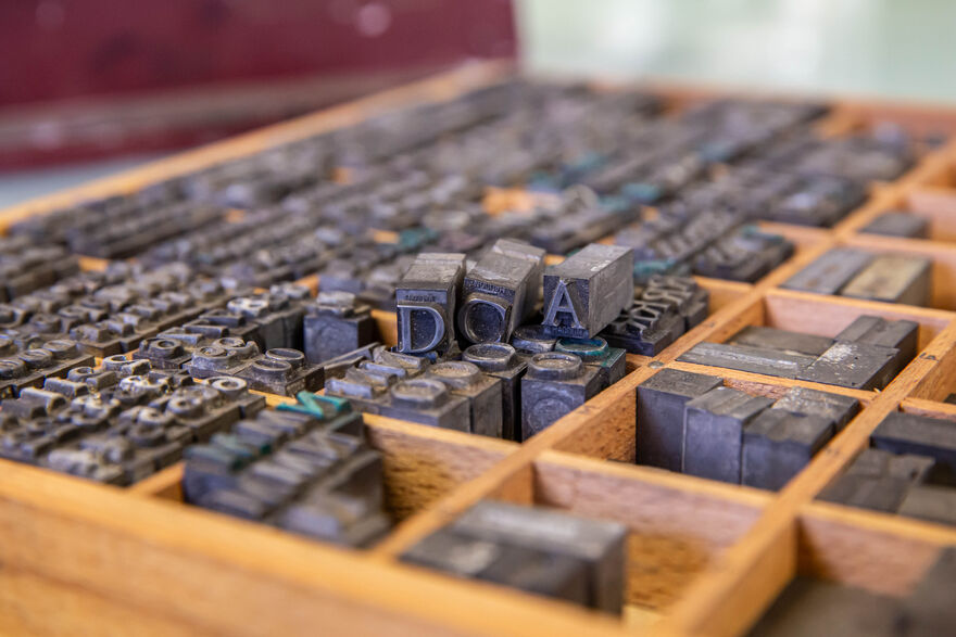 Drawer of letterpress letters with DCA letters sitting on top