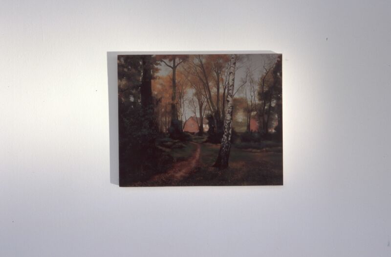A small painting of a brick house surrounded by autumnal trees.