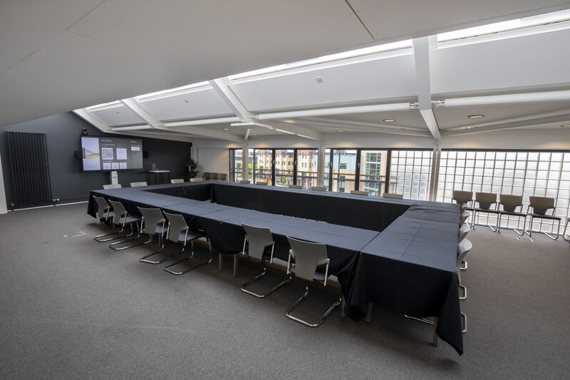 DCA Meeting Room. A large table is set up.