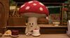 A happy mushroom chef in a stop motion animation film