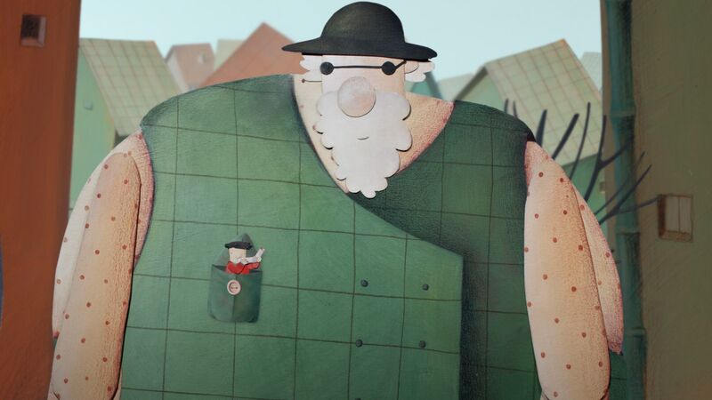 An animated still shows a large man in a green jacket and dark glasses, with a tiny man in his pocket.