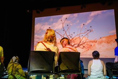 People engage in a sensory cinema experience in a cinema