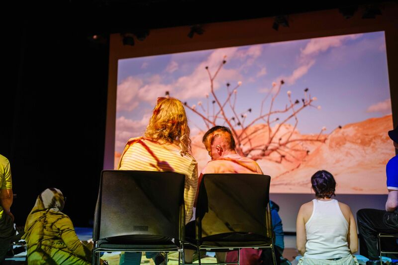 People engage in a sensory cinema experience in a cinema