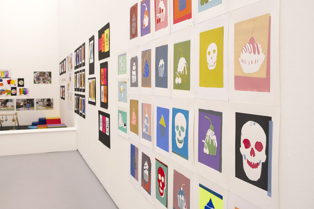 Display of screenprints on the wall of Gallery 1 for Spring Holiday Pop-up