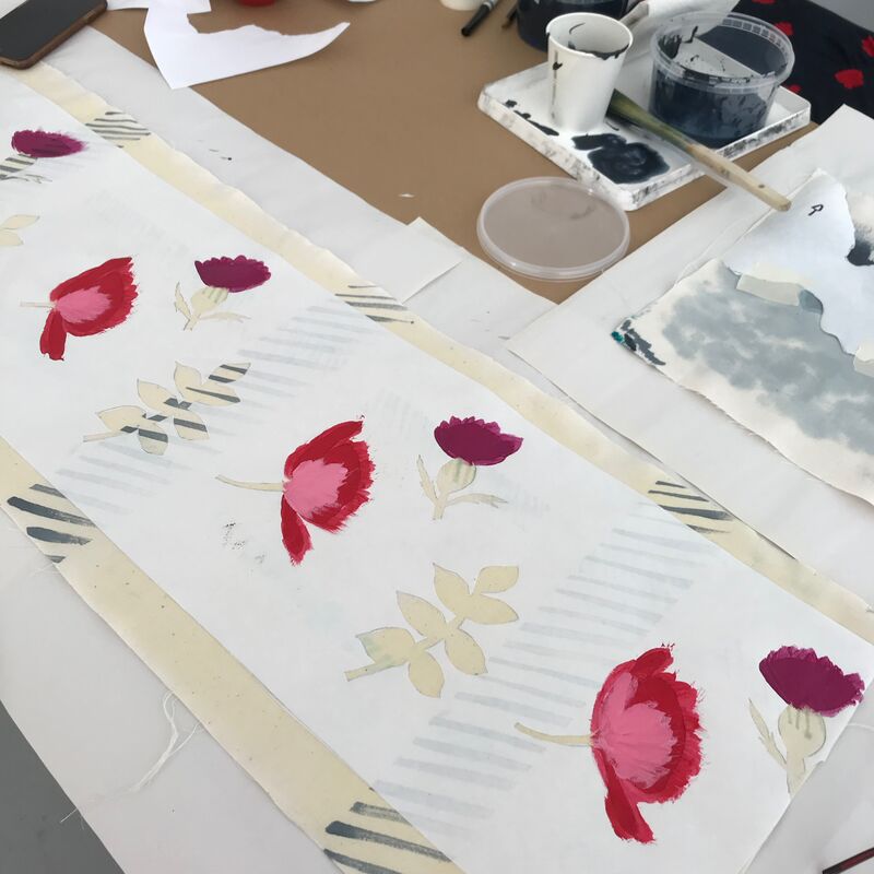 Painted flower design on lampshade fabric