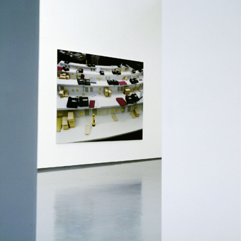From Thomas Demand's exhibition at DCA. A photograph how white shelves with boxes on them.