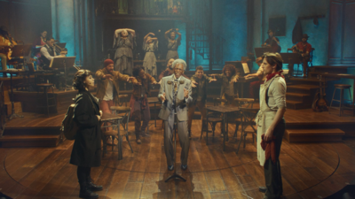 Musicians sing on stage in Hadestown