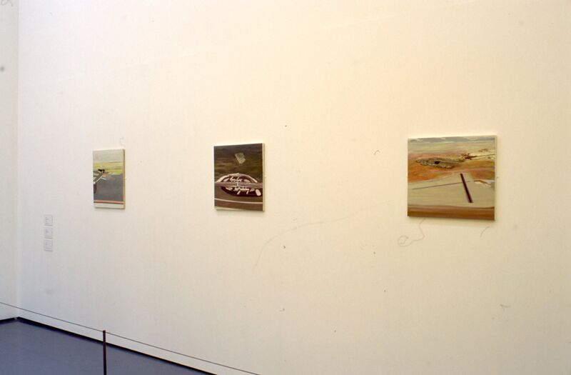 Small, abstract photographs hang on DCA Galleries.