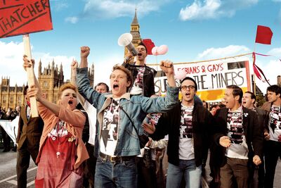 A group of young people march in protest.