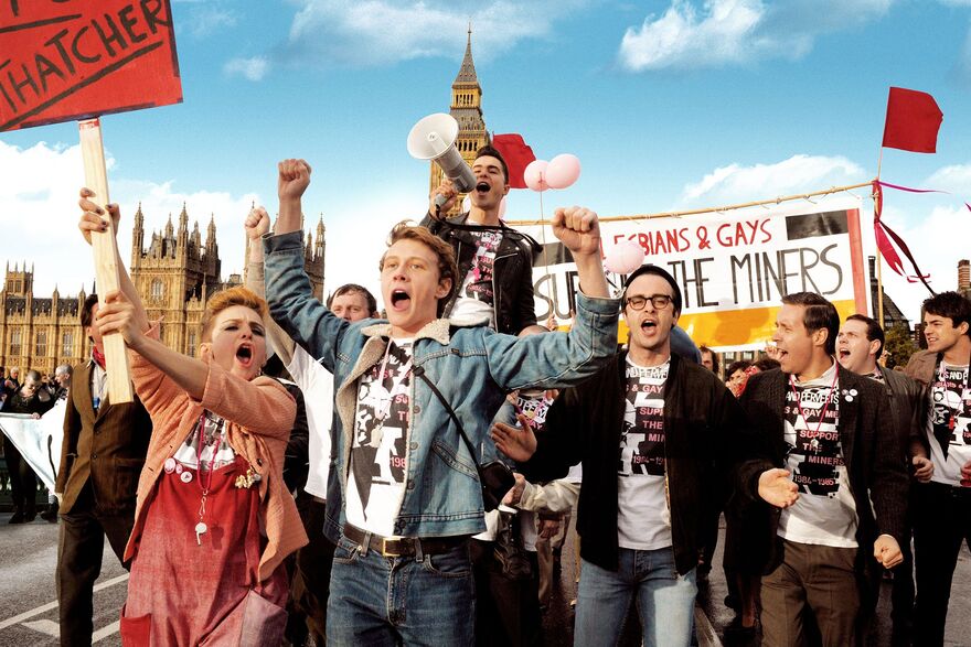 A group of young people march in protest.