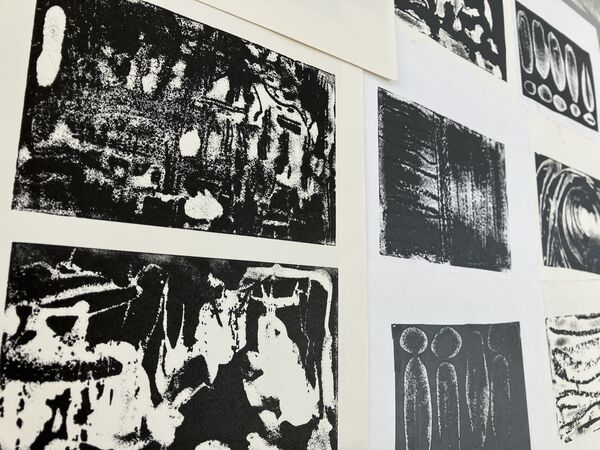 Collection of black prints made using experimental relief etching techniques