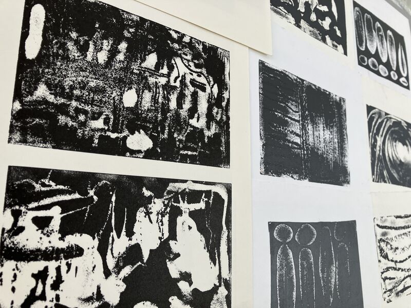 Collection of black prints made using experimental relief etching techniques