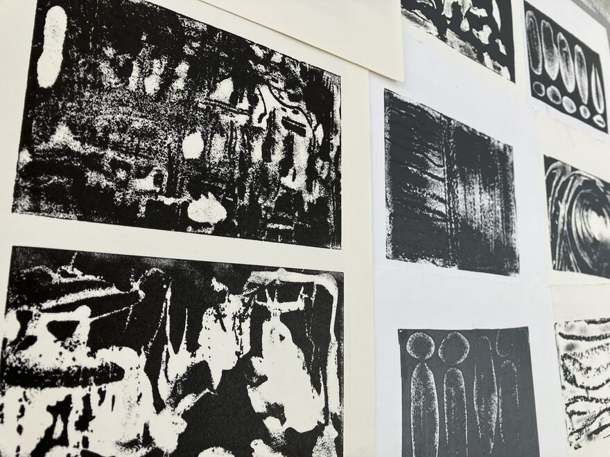 Collection of black prints made using experimental relief etching techniques