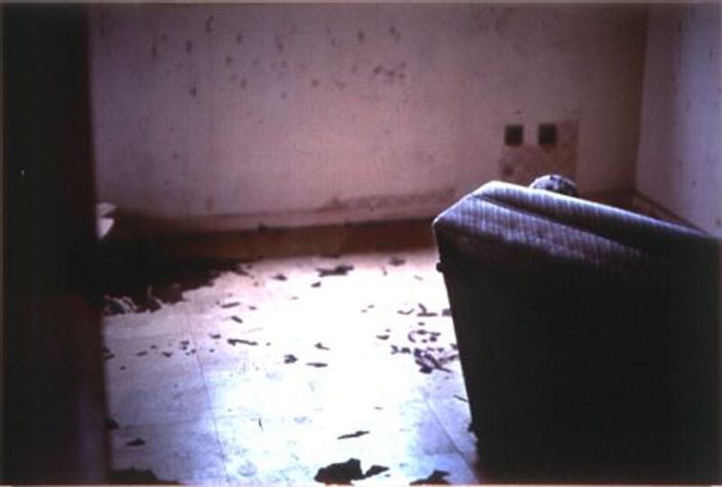 From Trauma at DCA Galleries. A photograph of a dirty, abandoned room.