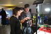 Two people animating using a tablet