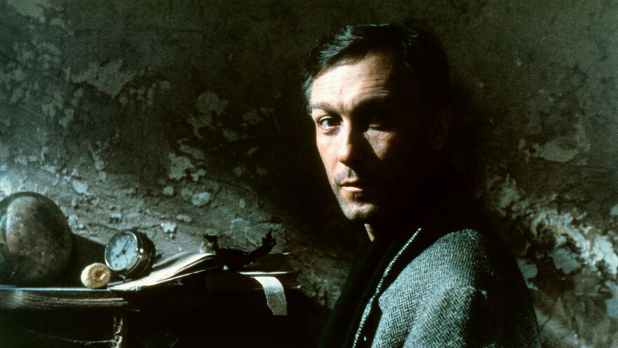 A man in a dimly lit room