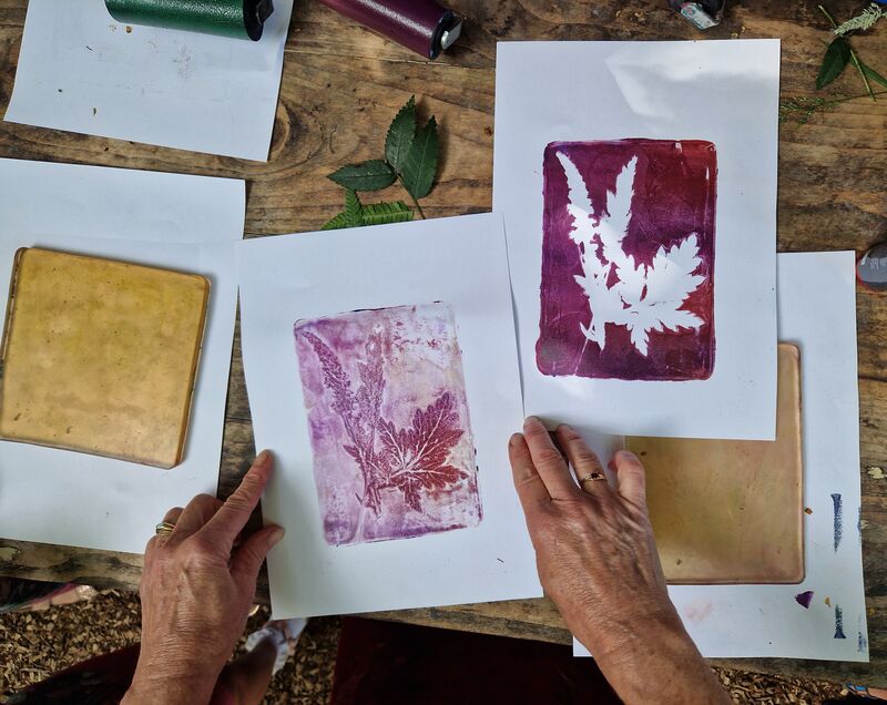 Person making leaf prints