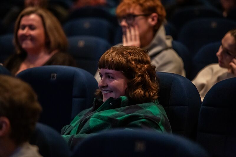 Smiling audience members at DCA Cinema