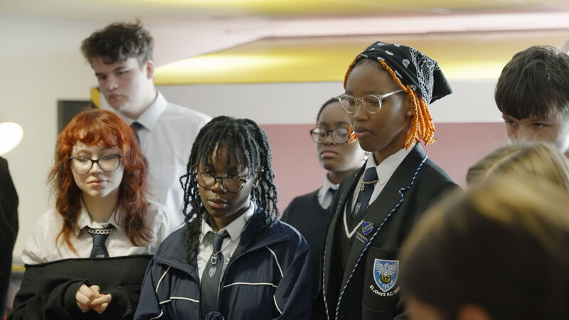 Group of school pupils in DCA Create Space watching a demonstration
