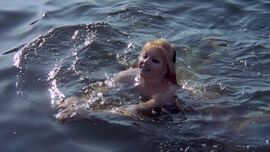 Woman swimming in water