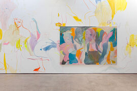 A painting on the wall with female figures the images spread onto the walls