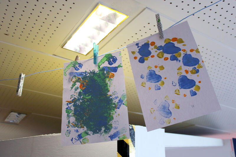 Prints hanging up to dry in Create Space