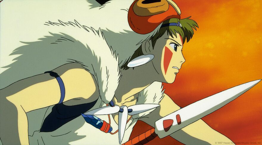 An anime still shows a woman with paint on her face and a large fur on her back holding a spear