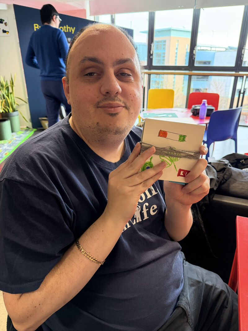 Person holding a handmade book