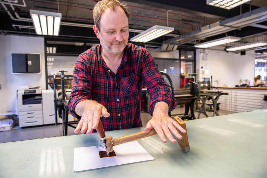 Person doing mezzotint printing in DCA Print Studio