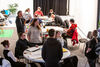 People sitting at tables in Centrespace working on animation ideas