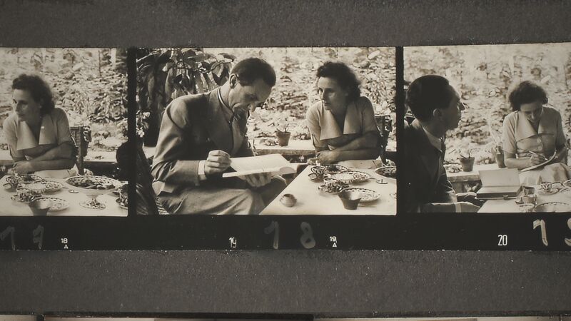 A series of black-and-white photos show Leni Riefenstahl talking to Josef Goebbels.