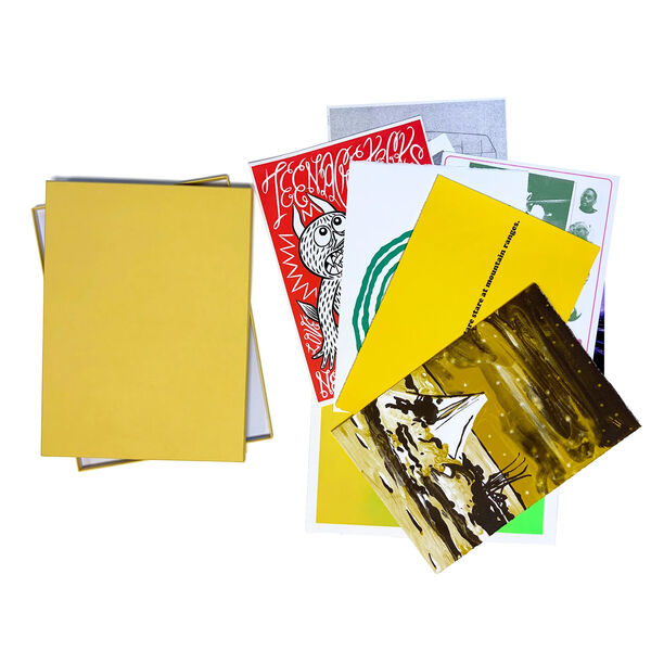 A collection of 10 assorted prints in a portfolio, featuring various artists, placed in a yellow archival box.