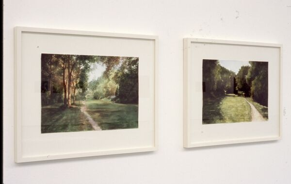 Framed paintings of gardens with trees.