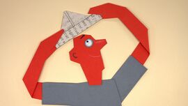 An animated man holds a paper hat above his head.