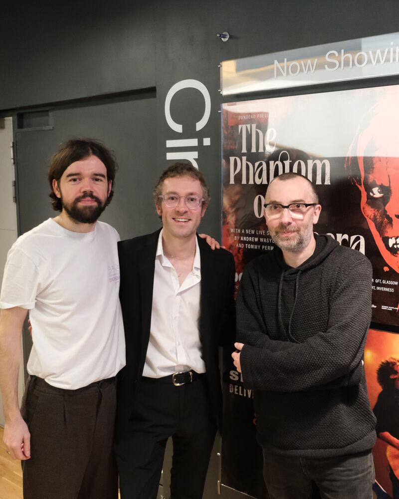  Andrew Wasylyk, Michael Coull and Tommy Perman beside The Phantom of the Opera poster outside DCA Cinema
