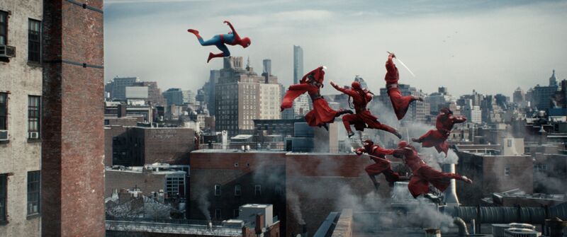 Spider‑Man jumps across rooftops towards several red‑robed figures with swords, all suspended mid-air over a city.