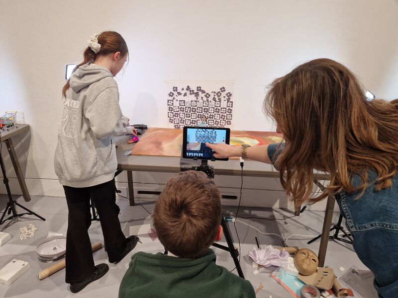 Children creating a stop motion animation a member of DCA's Learning team