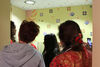 People gather to look at the new Infant Changing Space.