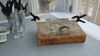 Pegs holding the cover of a book in place