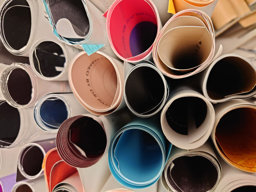 a pile of rolled-up posters