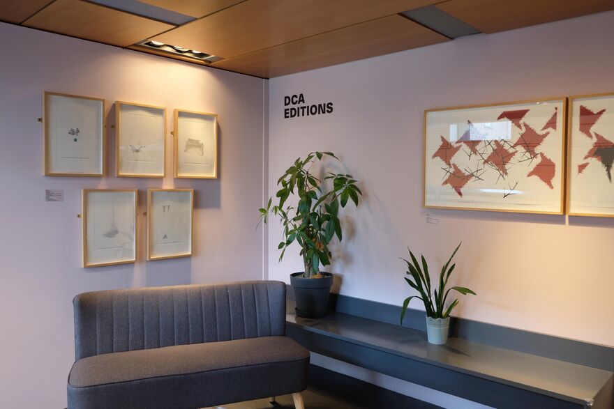 DCA Editions space with framed prints hung on the wall 