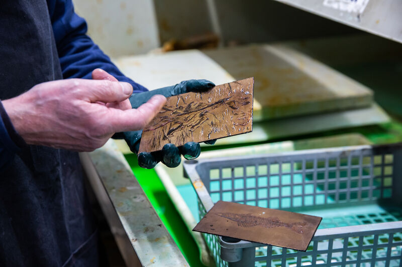 Tutor Bruce Shaw showing etching plate