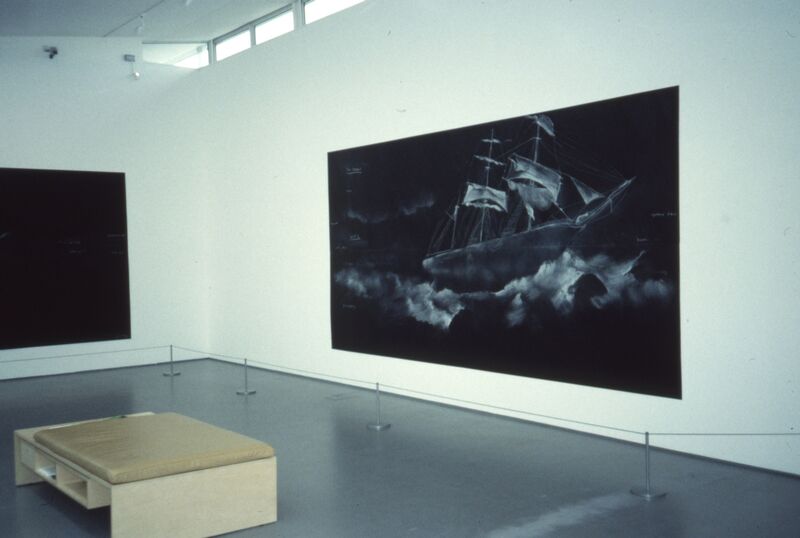 Tacita Dean's exhibition in DCA Galleries. A large black canvas with a white sailboat drawn on it in chalk hangs on the white gallery walls.