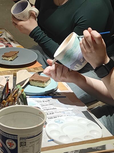 People painting ceramils